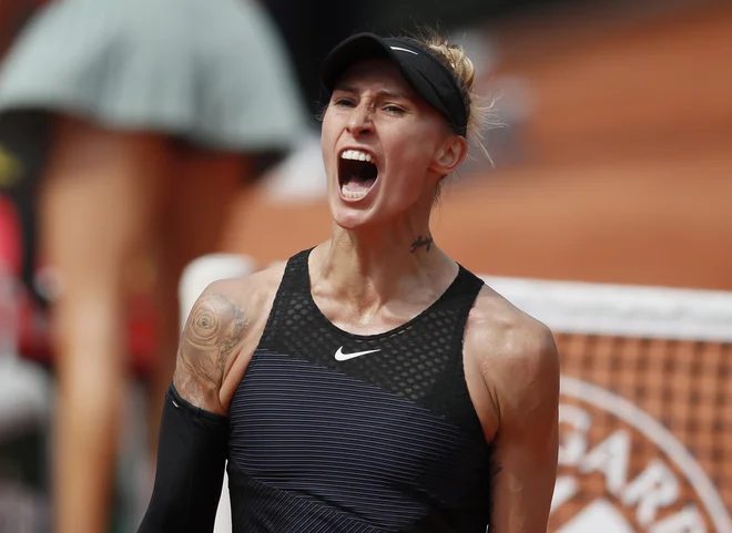 Polona Hercog se je razveselila zmage nad Caroline Garcia. FOTO: Gonzalo Fuentes/Reuters
