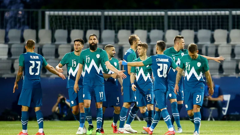 Fotografija: Slovenci so pričakovano visoko zmleli skromno reprezentanco Gibraltarja. FOTO: BorutćŽivuloviĆ/Reuters