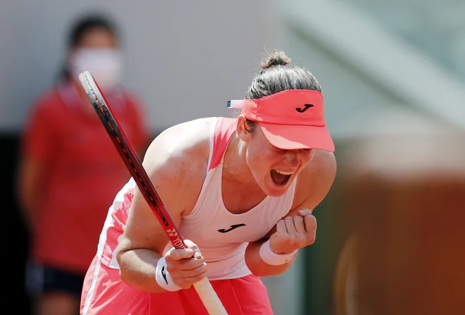 Tamara Zidanšek se je takole veselila uvrstitve v polfinale Roland-Garrosa. FOTO: Benoit Tessier/Reuters