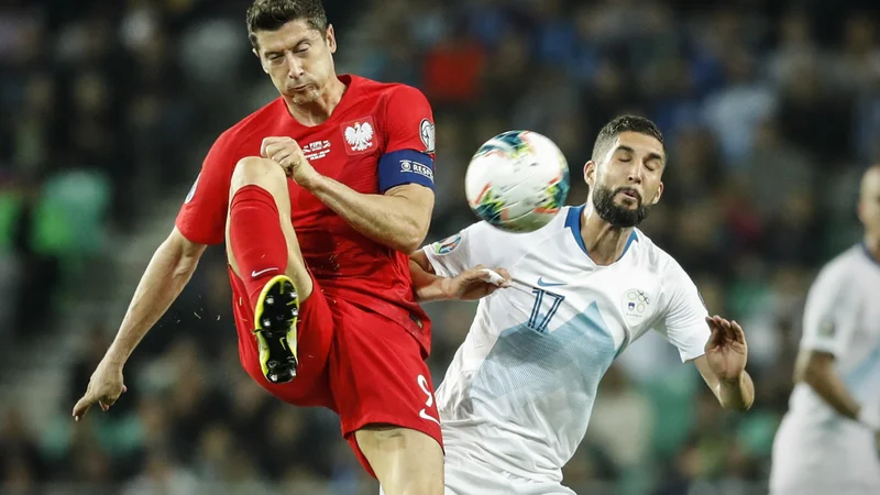Robert Lewandowski (na fotografiji ob zadnjem gostovanju v Sloveniji) na domači generalki za euro ni bil dobre volje. FOTO: Uroš Hočevar/Delo