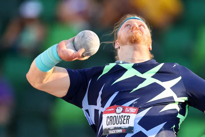 Ryan Crouser je kroglo zalučal do dolžine svetovnega rekorda. FOTO: Patrick Smith/AFP