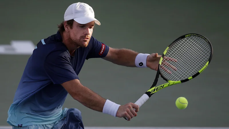 Fotografija: Blaž Kavčič je v prvem nastopu sklenil naskok na glavni turnir v Wimbledonu. FOTO: Blaž Samec