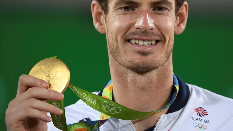 Fotografija: Andy Murray (na fotografiji) je iz Ria de Janeira leta 2016 prinesel zlato odličje. FOTO: Toby Melville/Reuters