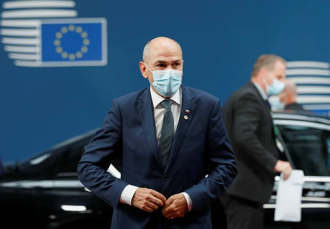 Janša je prispel na vrh, a ni odgovarjal na vprašanja novinarjev, kar je sicer utečena praksa. FOTO: Johanna Geron/Reuters