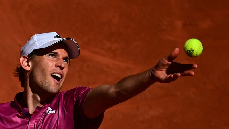 Fotografija: Dominic Thiem bo izpustil nastop na teniških igriščih Wimbledona. FOTO: Martin Bureau/AFP