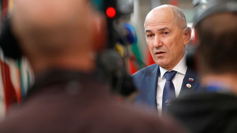 Fotografija: Premier Janša kot pot za razjasnitev dvomov o madžarskem zakonu zagovarja pravno pot. FOTO: Olivier Matthys/AFP