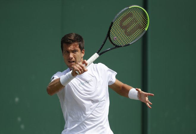 Drugi nastop Aljaža Bedeneta v letošnjem Wimbledonu je bil prav bleščeč. FOTO: Paul Childs/Reuters