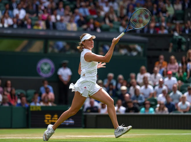 Kaja Juvan je preskočila dve wimbledonski oviri, tretja je bila previsoka. FOTO: Jed Leicester/Reuters