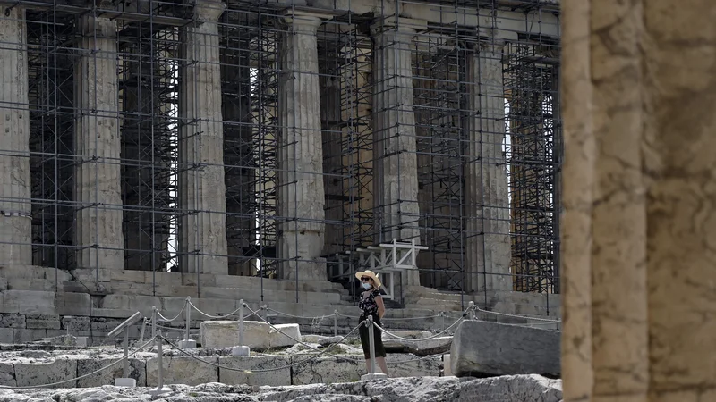 Fotografija: Peklenska vročina je zadnjih nekaj dni udrihala tudi po Grčiji. Podnebne spremembe ogrožajo celotno civilizacijo. FOTO: Louisa Gouliamaki/AFP