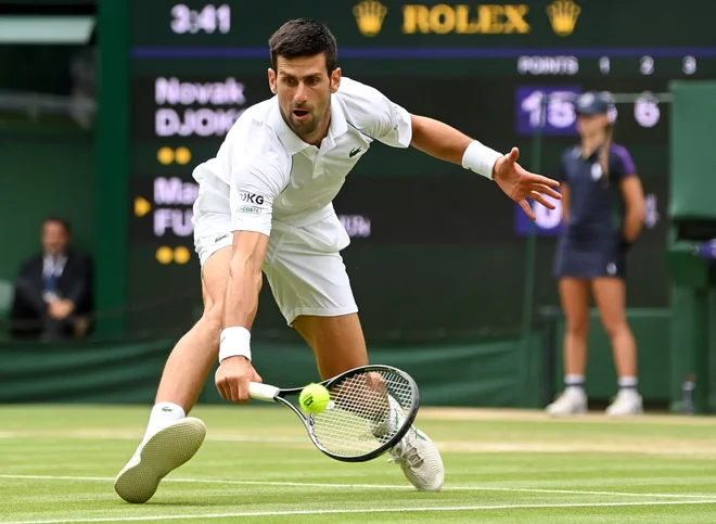 Novak Đoković se ni preveč utrudil proti Madžaru. FOTO: Toby Melville/Reuters