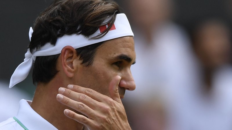 Fotografija: Federer je daleč od stare forme. FOTO: Toby Melville/Reuters