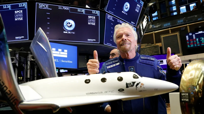 Fotografija: Sir Richard Branson bo moral opisati celotno uporabniško izkušnjo poleta v vesolje. Ocena verjetno ne bo slaba. FOTO: Brendan Mcdermid/Reuters