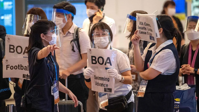 Fotografija: Povečevanje okužbe z virusom sars-cov-2 vznemirja japonske prireditelje olimpijskih iger. FOTO: Kazuhiro Nogi/AFP