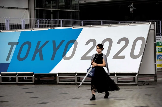 Odštevajo se dnevi do začetka tokijskih olimpijskih iger. FOTO: Behrouz Mehri/AFP