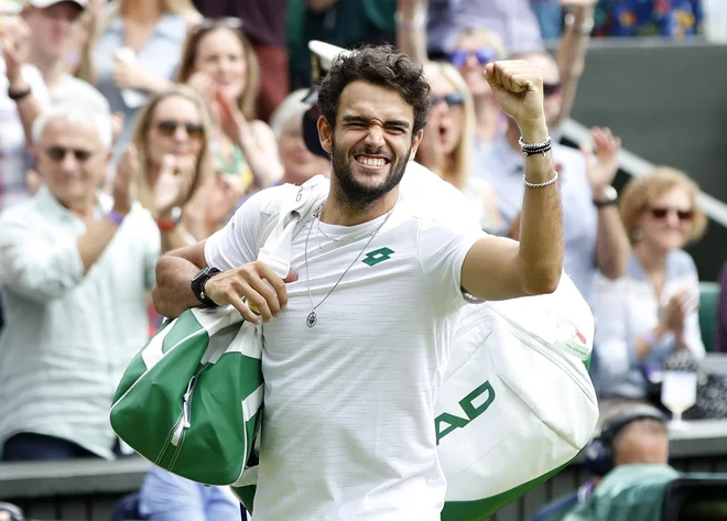 Matteo Berrettini je bil po zmagi v polfinalu brez besed, a z velikim nasmehom. Foto Paul Childs/Reuters