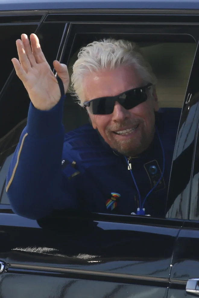 Milijarder Richard Branson je eden izmed šesterice na krovu vesoljskega letala VSS Unity.  FOTO: Joe Skipper Reuters