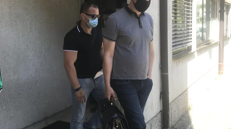 Borut Banfi (zadaj) z zagovornikom Borisom Kandutijem.<br />
FOTO: Moni Černe