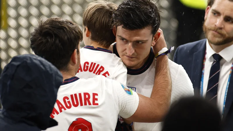 Fotografija: Harry Maguire z družino po koncu finala. FOTO: John Sibley/Reuters