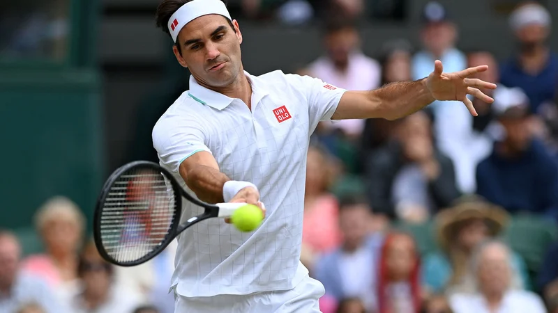 Fotografija: Roger Federer zaradi poškodbe odpovedal nastop na OI. FOTO: Glyn Kirk/AFP