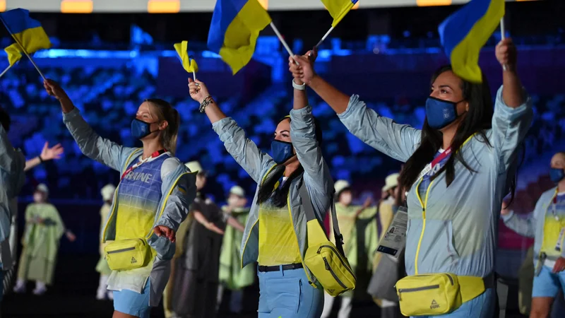 Fotografija: Rusko občinstvo v prenosu slovesnega odprtja olimpijskih iger ni videlo Ukrajincev. FOTO: Andrej Isaković/AFP