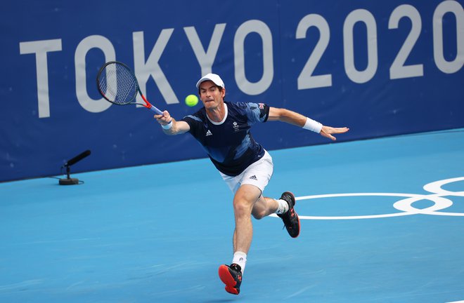 Zmagovalec iz Ria de Janeira Andy Murray je zaradi poškodbe odpovedal nastop v posamični konkurenci, ostal pa je v konkurenci dvojic. FOTO: Mike Segar/Reuters
