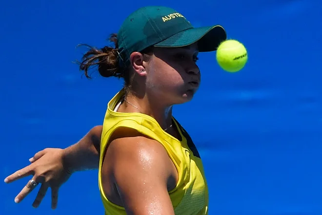 Ashleigh Barty lahko olimpijsko kolajni osvoji le še v dvojicah. FOTO: Tiziana Fabi/AFP