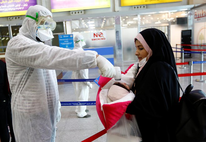 V Iraku in Iranu beležijo velik porast okužb. FOTO: Alaa Al-Mardžani/Reuters
