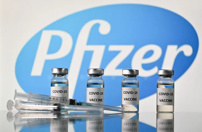 Podjetje Pfizer s cepivom dobro služi. FOTO: Justin Tallis/AFP