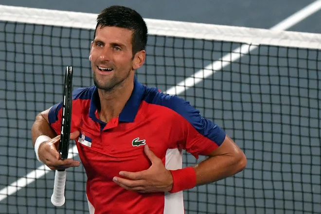 Novak Đoković gre olimpijski zlati medalji naproti. FOTO: Tiziana Fabi/AFP