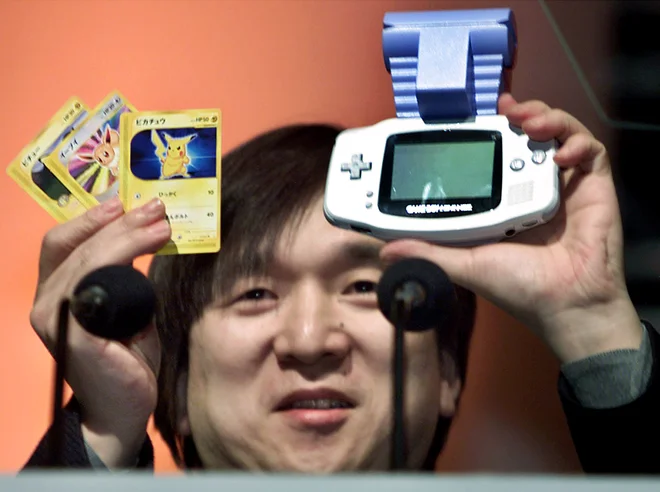 Pokemoni gredo za med. Po zadnjih podatkih so na svetu prodali 34 milijard kart in 300 milijonov videoigric. FOTO: Eriko Sugita/Reuters