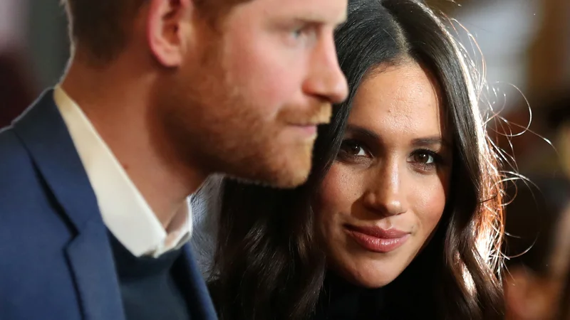 Fotografija: Večina se strinja, da je Harry v zakonu postal prava copata in da je Meghan tista, ki nosi hlače. FOTO: Andrew Milligan/Reuters