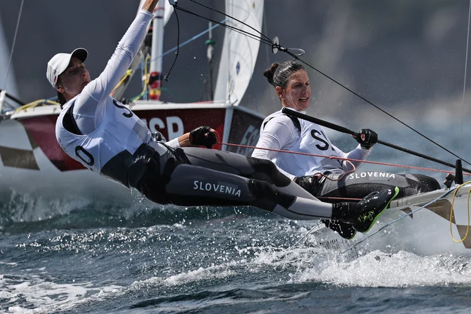 Tina Mrak in Veronika Macarol se izboljšujeta. FOTO: Carlos Barria/Reuters