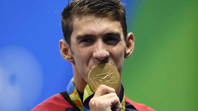 Fotografija: Za neustavljivega plavalca Michaela Phelpsa so bile igre v Riu zadnje. FOTO: Gabriel Bouys/AFP