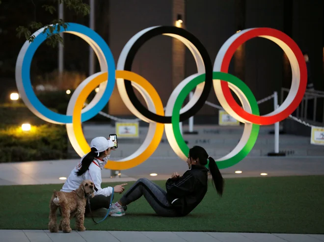 Olimpijske igre v Tokiu: od 1. julija do danes že 246 okuženih.  FOTO: Kim Kyung-hoon/reuters