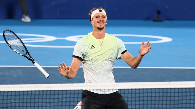 Alexander Zverev ni skrival veselja ob zmagoslavju na OI. FOTO: Mike Segar/Reuters