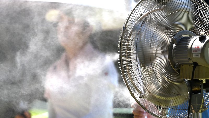 Fotografija: Ob žgočih temperaturah je bilo igralkam na igriščih kluba Kasumigaseki v zadnjem času pošteno vroče. Zdaj prihaja viharna ohladitev. FOTO: Toby Melville/Reuters