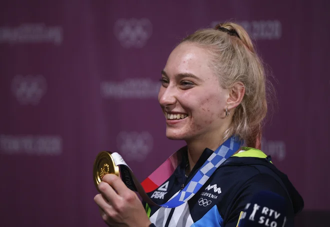 Janja Garnbret je garala za tokijske olimpijske igre, zdaj lahko uživa zlati sad. FOTO: Maksim Šemetov/Reuters