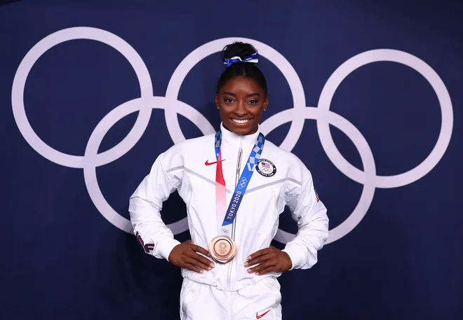 Simone Biles je vsaj začasno izstopila iz tekme za športnico z največ kolajnami vseh časov. Foto Mike Blake/Reu&shy;ters