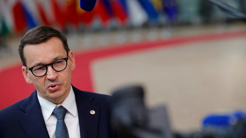 Fotografija: Le Premier ministre polonais Mateusz Morawiecki a réclamé mardi l'éviction du chef de file de l'une des formations membres de sa coalition gouvernementale. /Photo prise le 25 juin 2021/REUTERS/Olivier Matthys