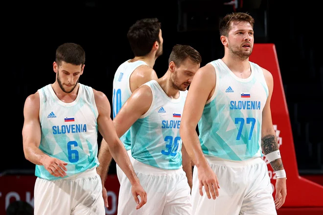 Slovenci so kljub porazu v tekmi za bron proti Avstraliji dvorano Saitama zapuščali ponosni. FOTO: Brian Snyder/Reuters