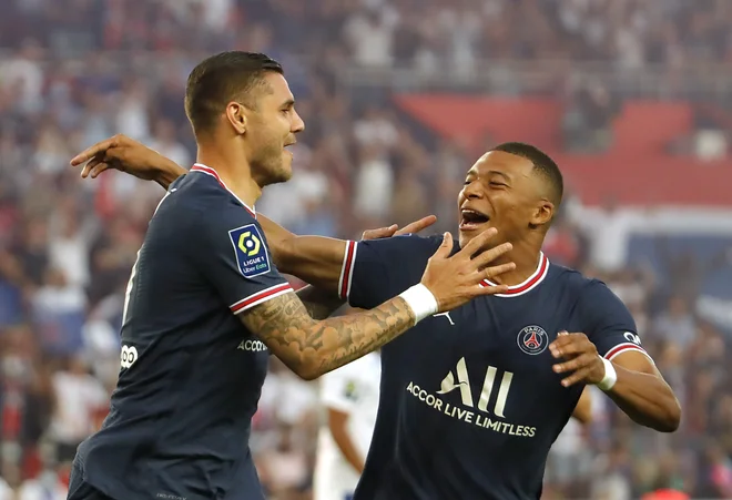 Mbappé, ki so ga pred tekmo izžvižgali, je lahko hitro proslavil vodilni zadetek Maura Icardija. FOTO: Sarah Meyssonnier/Reuters