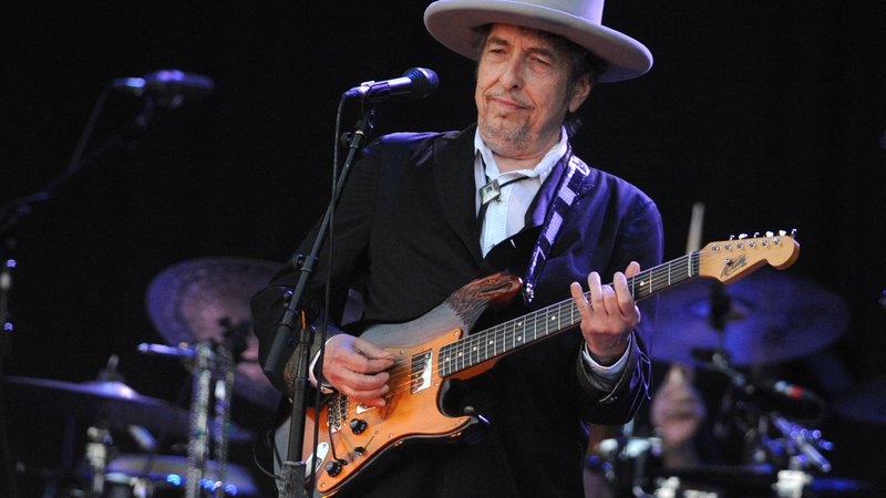 Fotografija: Z Bobom Dylanom so The Times They Are A-Changin' pele generacije. Leto dni po izidu albuma naj bi tedaj 23-letni pesnik posilil dvanajstletnico. FOTO: Fred Tanneau/AFP