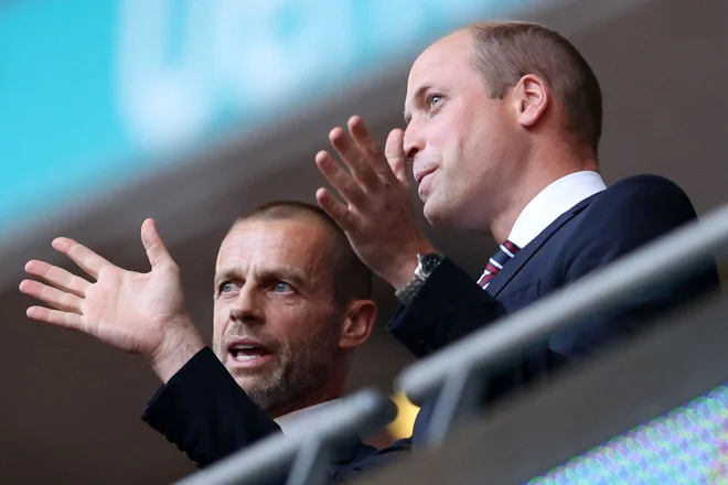 Čeferin med tekmo eura 2020 ob princu Williamu. FOTO: Catherine Ivill/AFP