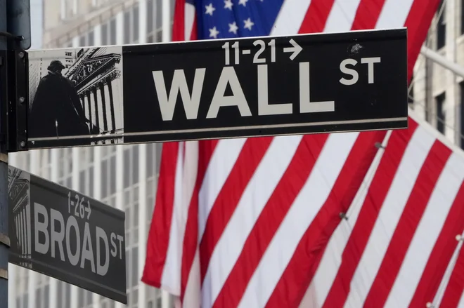 Do leta 2030 bi roboti na Wall Streetu lahko nadomestili 1,3 milijona zaposlenih. FOTO: Carlo Allegri/ Reuters