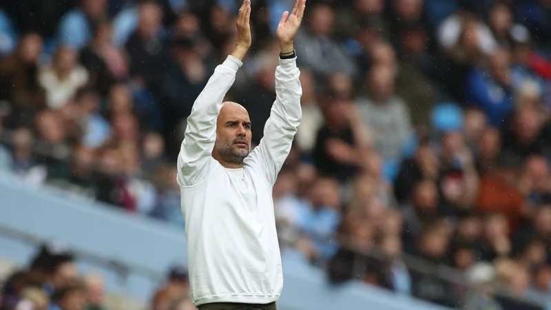 Fotografija: Guardiola (na fotografiji) še pri nobenem klubu ni tako dolgo sedel na klopi kot ravno pri Manchester Cityju. FOTO: Lee Smith/Action Images