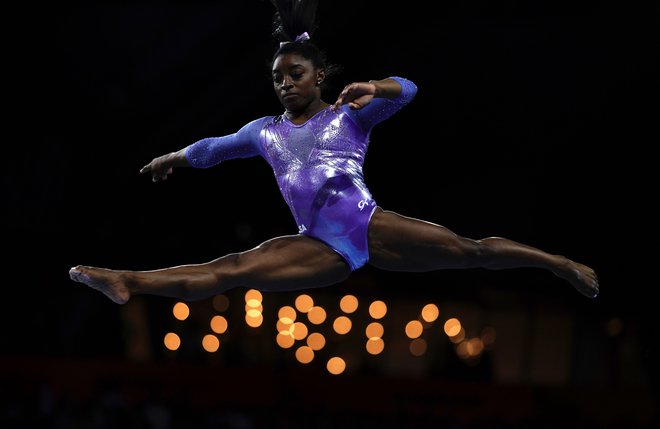 Med letošnjimi olimpijskimi igrami je imela težave Simone Biles. FOTO: Lionel Bonaventure/AFP