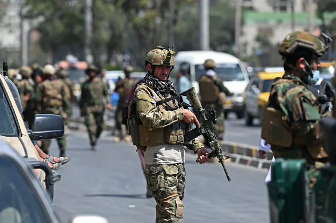 ZDA imajo na voljo še zadnje ure, preden se v torek izteče rok za umik ameriških sil iz Afganistana. FOTO: Aamir Qureshi/AFP