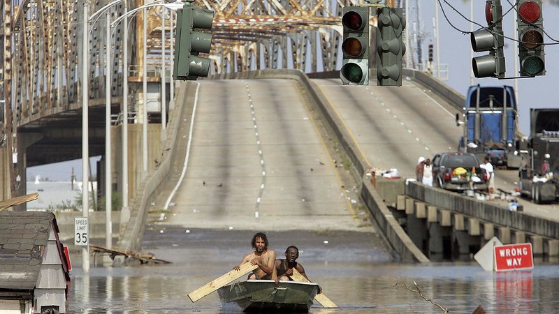 Fotografija: Orkani, med njimi tudi Katrina (na fotografiji), so v zadnjih 50 letih povzročili največ škode med katastrofami, povezanimi z vremenom in podnebjem. FOTO: Mario Tama/AFP