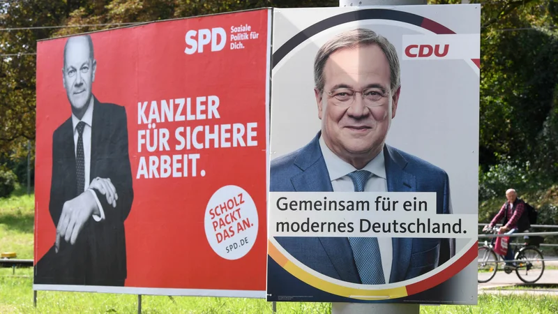 Fotografija: Olaf Scholz (SPD) in Armin Laschet (CDU) v nepričakovanem dvoboju za vstop v kanclersko palačo FOTO: Thomas Kienzle/AFP