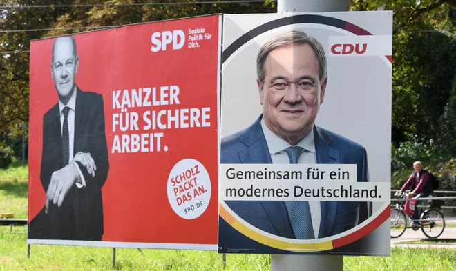 Olaf Scholz (SPD) in Armin Laschet (CDU) v nepričakovanem dvoboju za vstop v kanclersko palačo FOTO: Thomas Kienzle/AFP